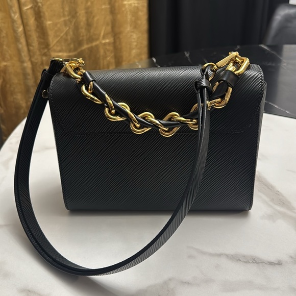 Louis Vuitton Twist MM black& gold hand bag. - Picture 6 of 7